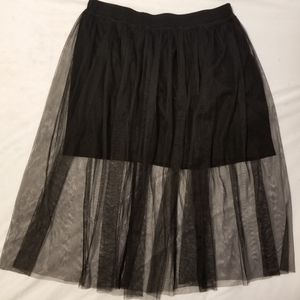 Mossimo black mini skirt with longer tule overlay. Size L